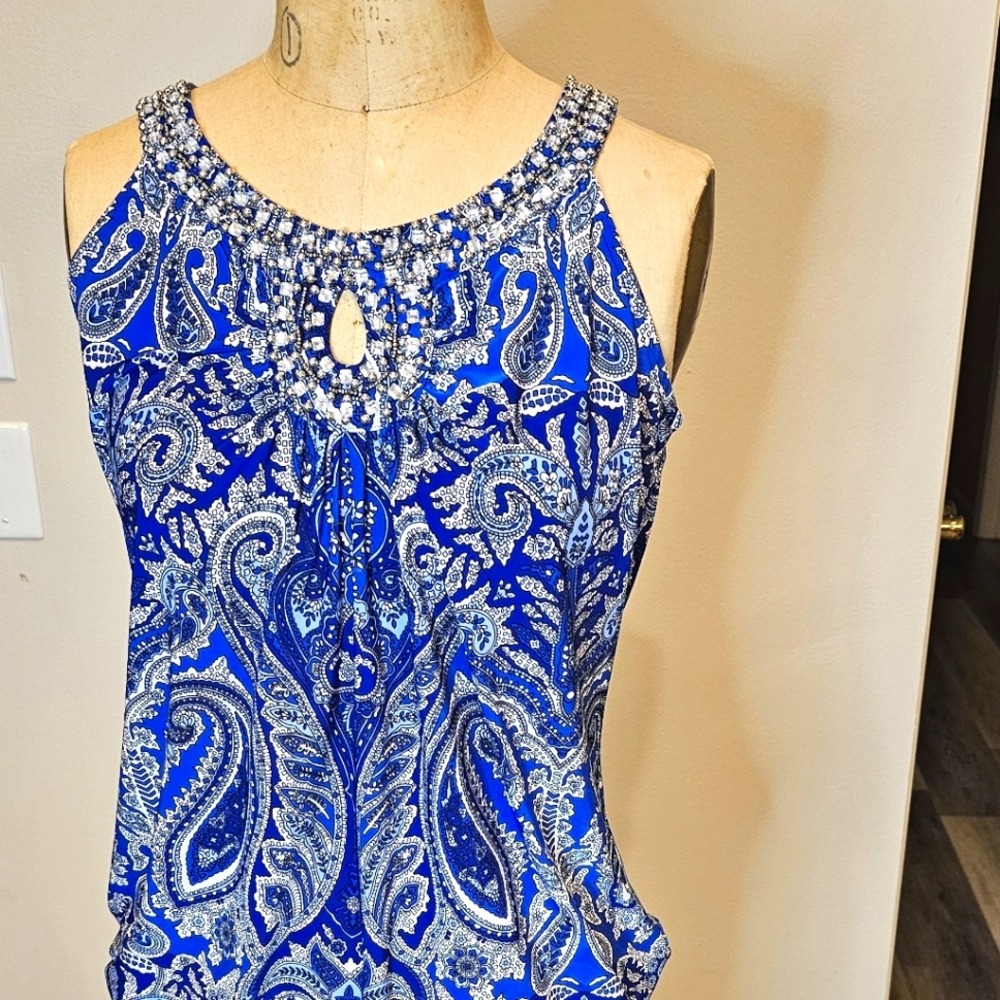 INC Beaded top with elastic bottom seam detail.